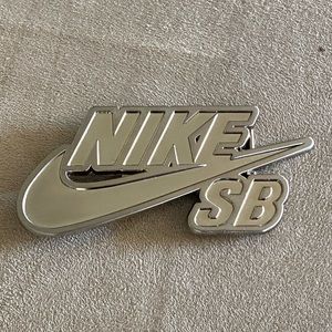 Never worn Nike SB Swoosh belt buckle.